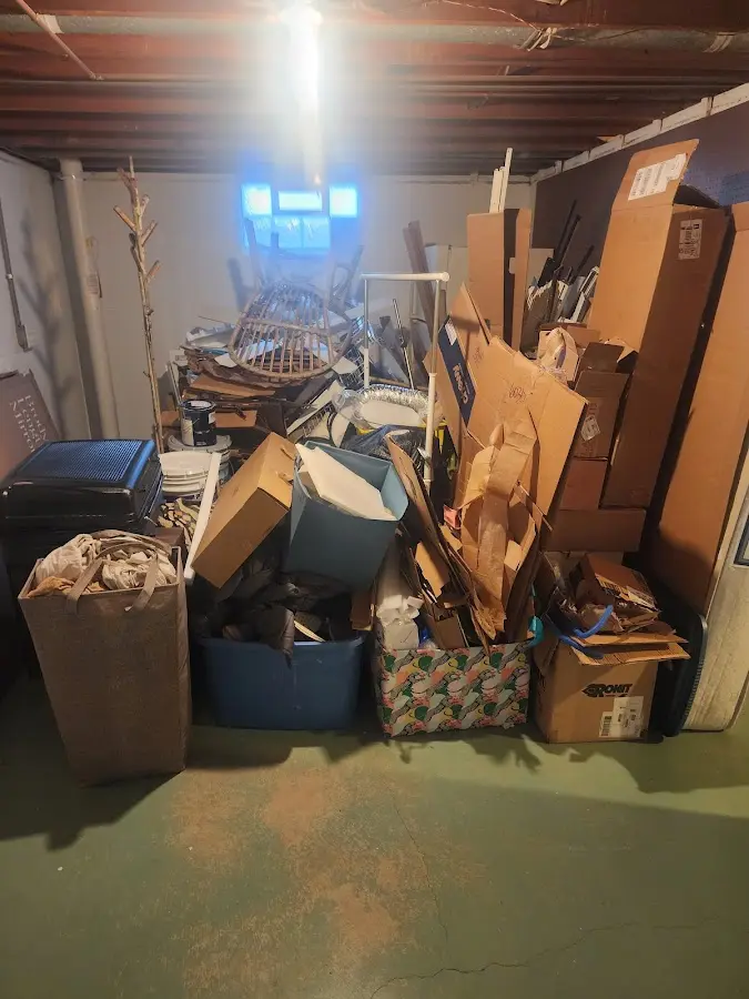 Roll-off dumpster container at job site for 15 Yard Dumpster Rental in Raytown